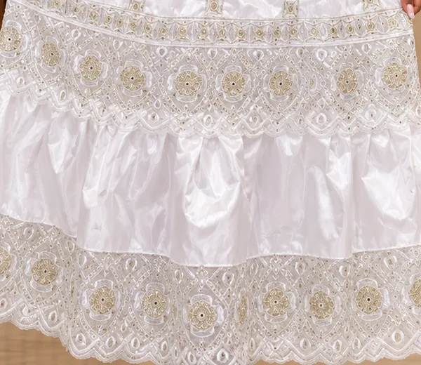 Détail de broderie ivoire